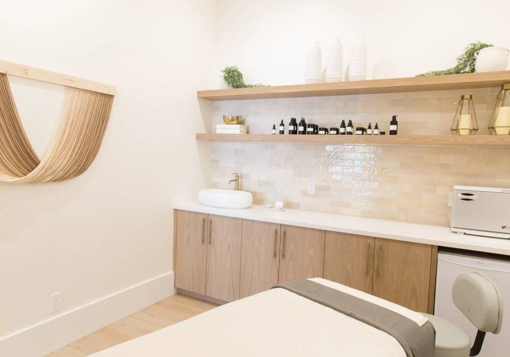 A room with wooden cabinets and shelves in it